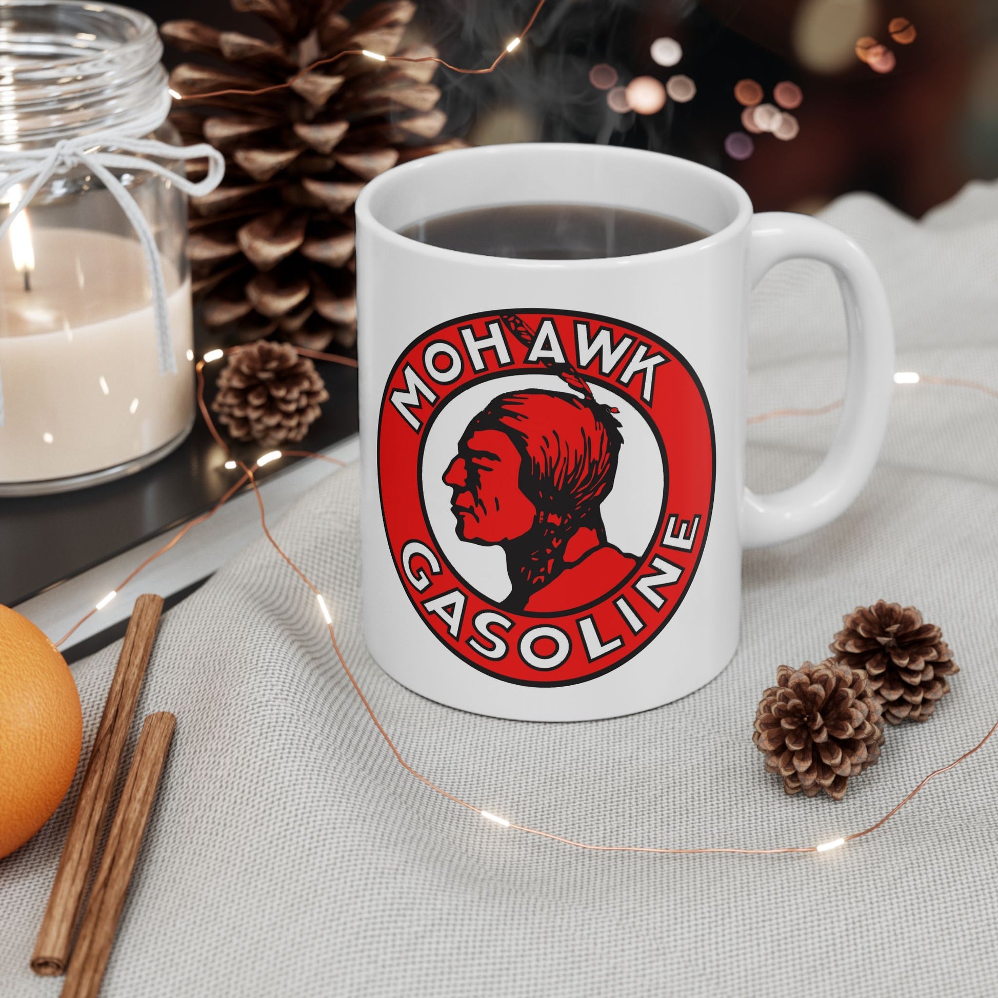 Mohawk Gasoline white coffee mug angle view — bold Native American logo — The Faded Label Co.
